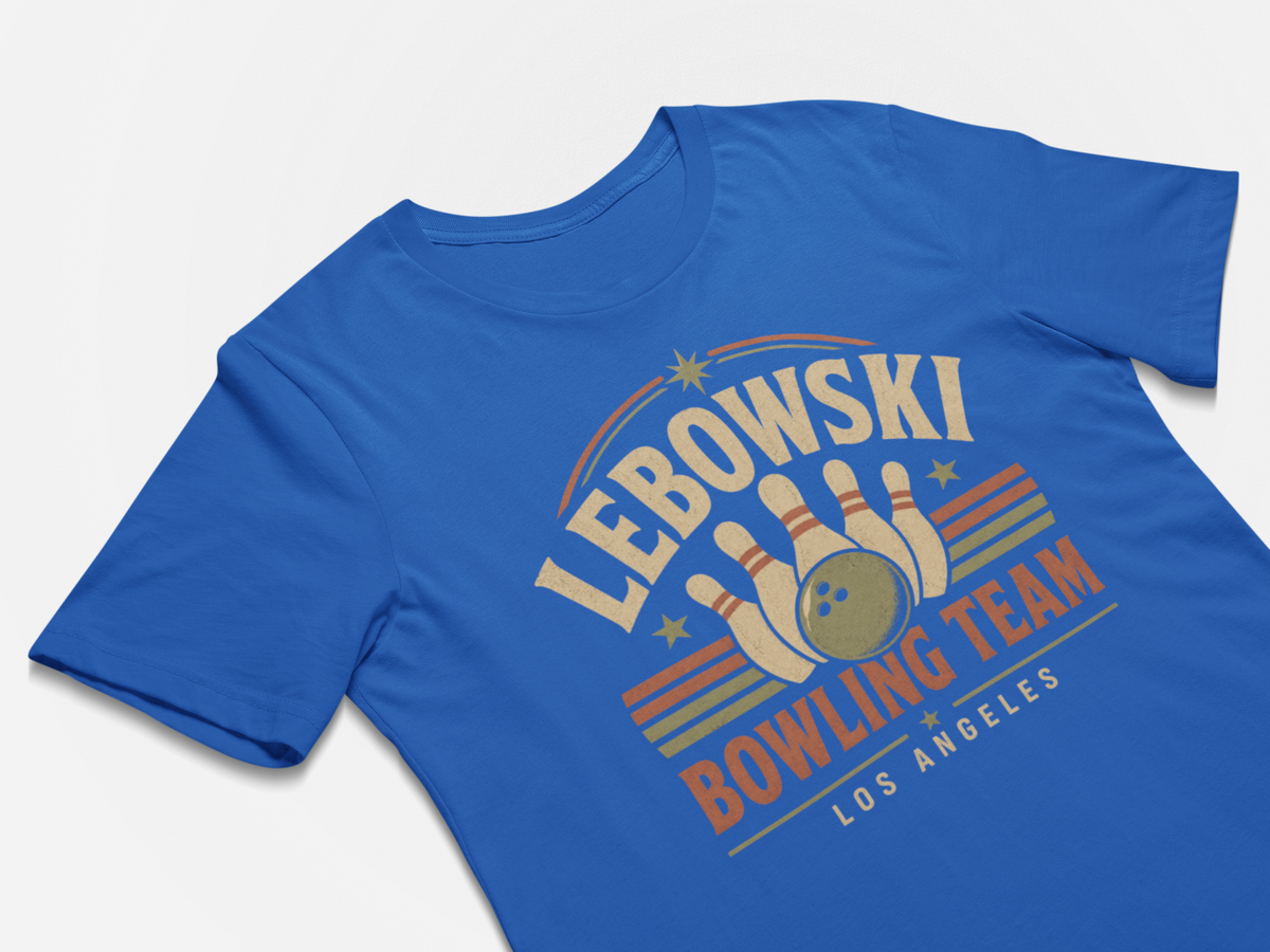 A royal blue short-sleeve t-shirt with a retro bowling graphic on the front, featuring the text 'LEBOWSKI BOWLING TEAM LOS ANGELES' and bowling pins with a bowling ball.