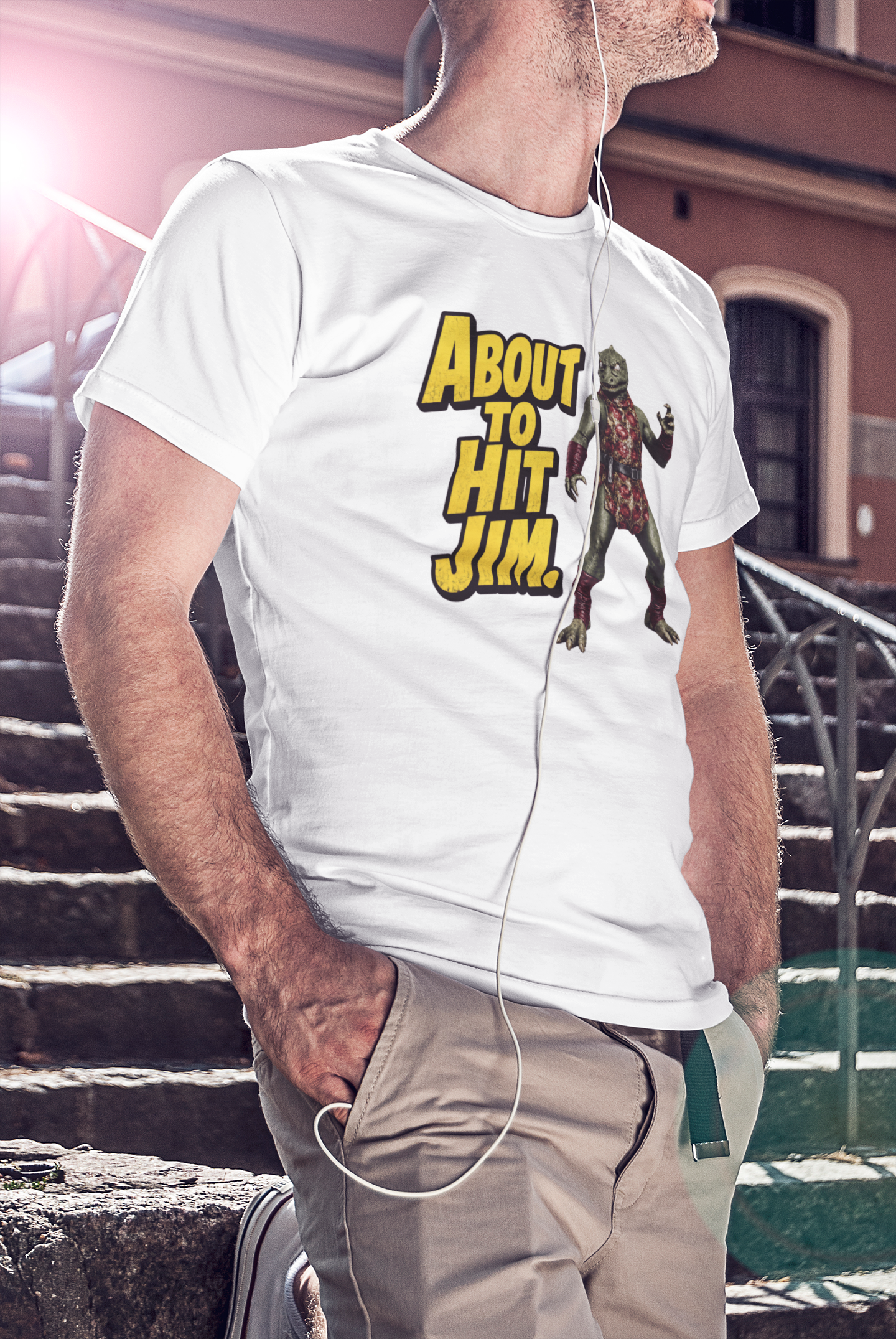 Person wearing a white t-shirt with 'About to Hit Jim' graphic design.