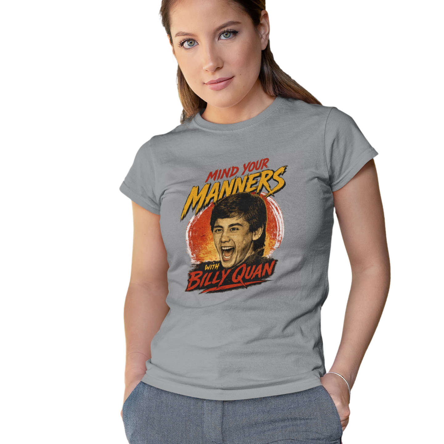 Woman wearing a gray t-shirt with a graphic design and text on a white background