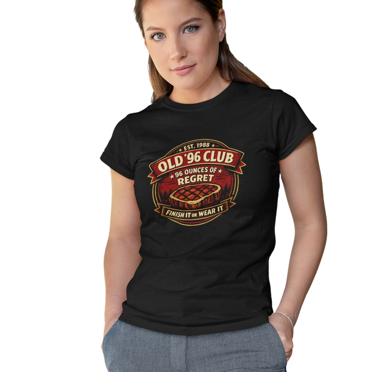 Woman wearing a black t-shirt with a graphic design on a white background