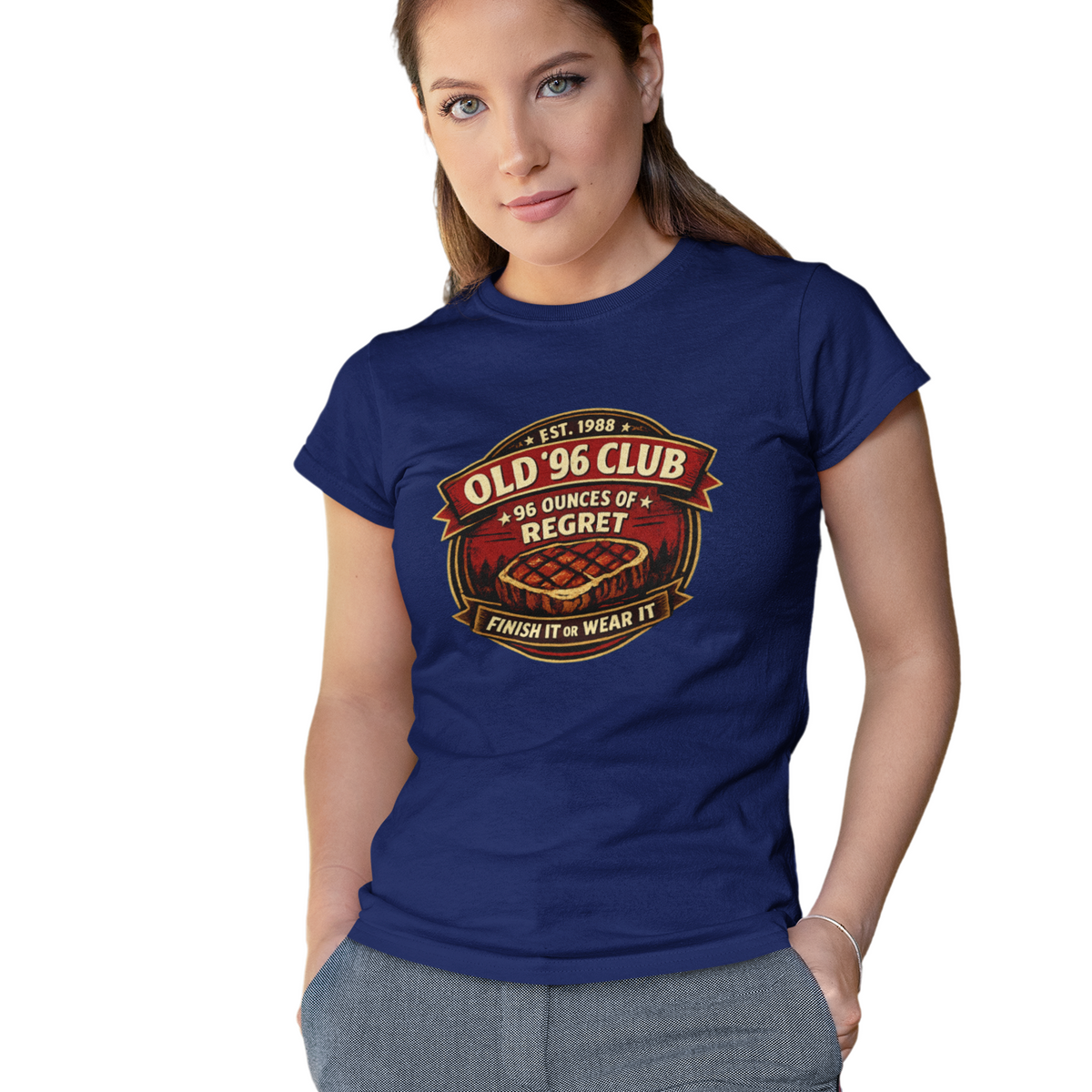 Woman wearing a blue t-shirt with a graphic design on a white background