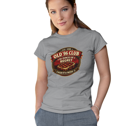 Woman wearing a gray t-shirt with a graphic design on a white background